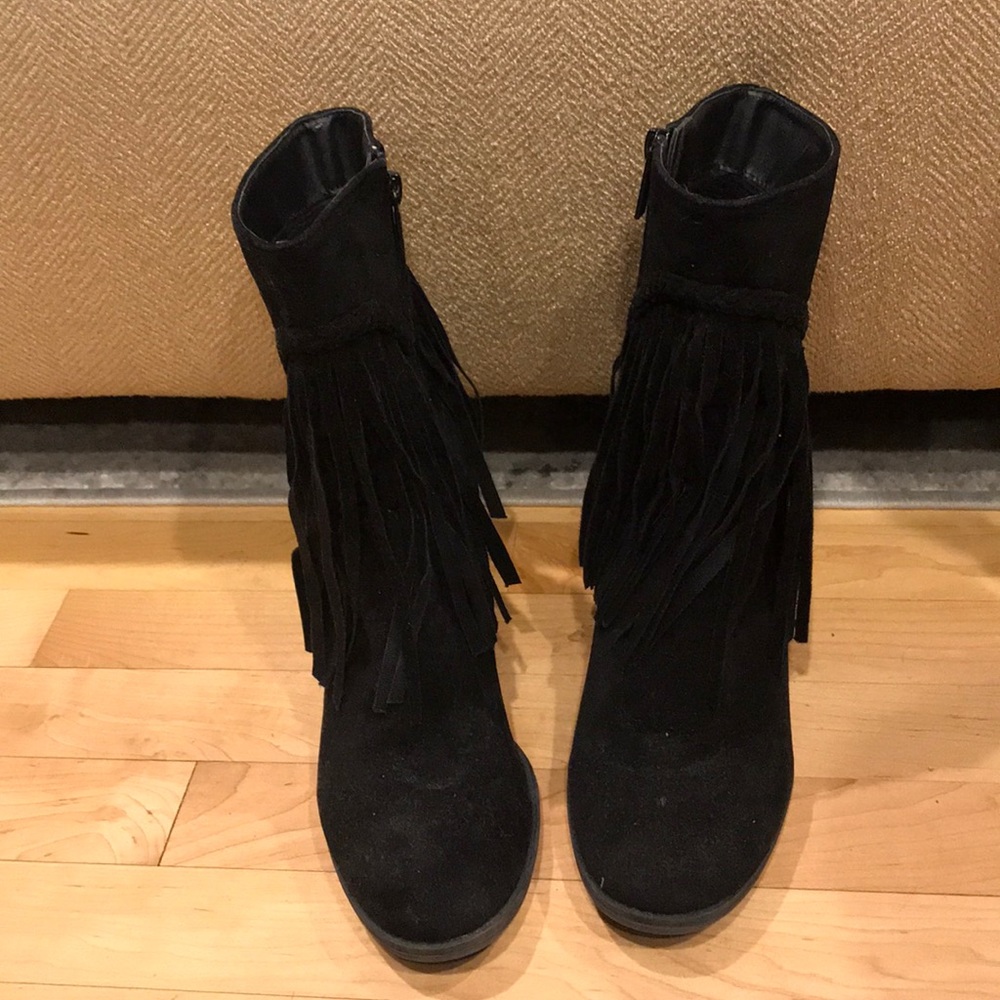 Faux suede black fringe heeled booties.